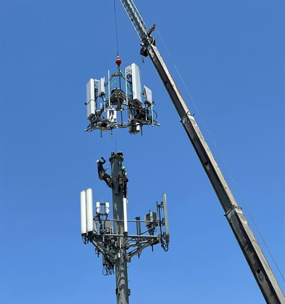 Speakeasy Telecommunications working on communication towers in Driftwood, Texas